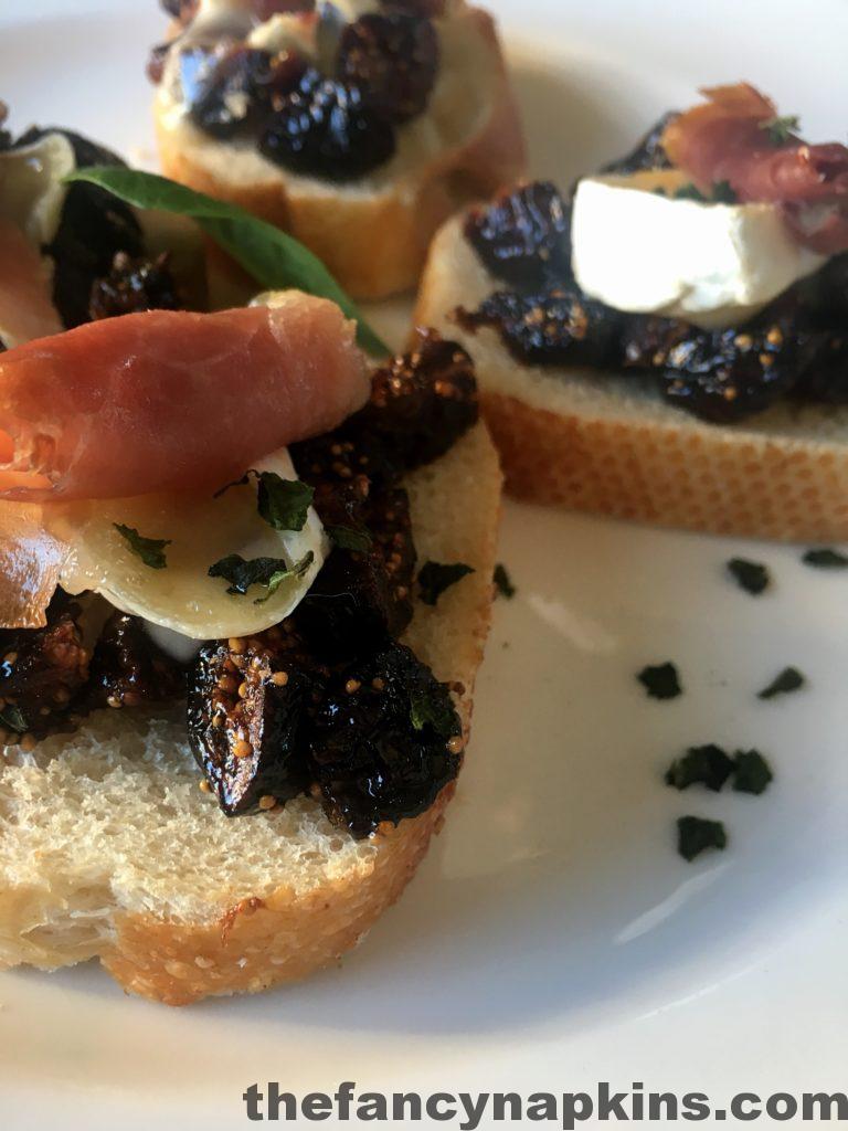 Prosciutto, brie and caramelized fig crostini